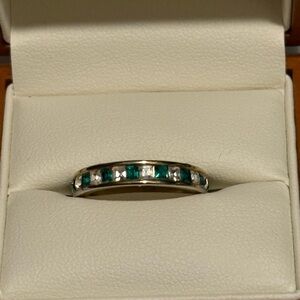 Elegant Silver and Green Stone Eternity Band